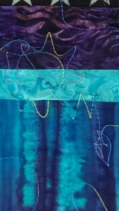 Quilt'm quilting logo