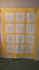 embroidered flowers quilt